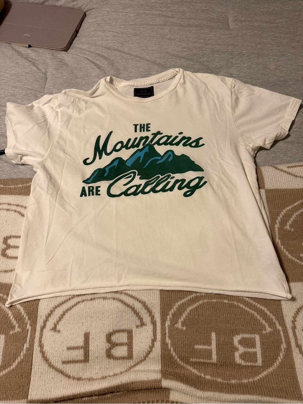 Original Retro Brand White Tee “THE MOUNTAINS ARE CALLING”